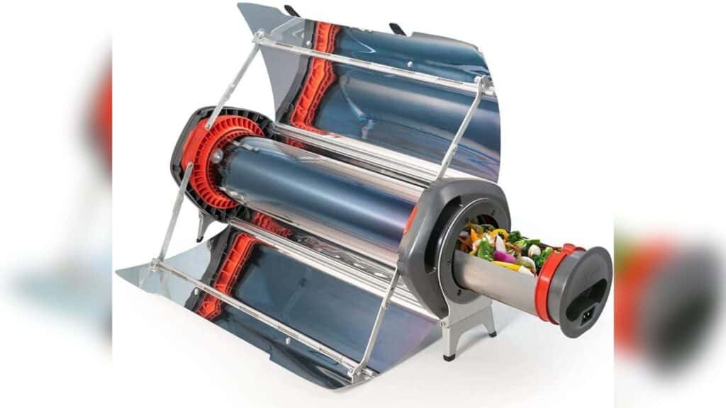 Image is of a GO SUN Fusion solar oven. The oven is a silver cylinder that has mirrors that unfold from it to reflect sunlight into the oven. The background is white.