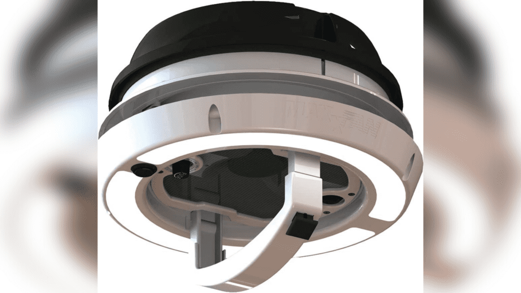 Image shows a round vent fan that is in the shape of a mushroom. The lower half of the vent fan is white and the upper half is black.