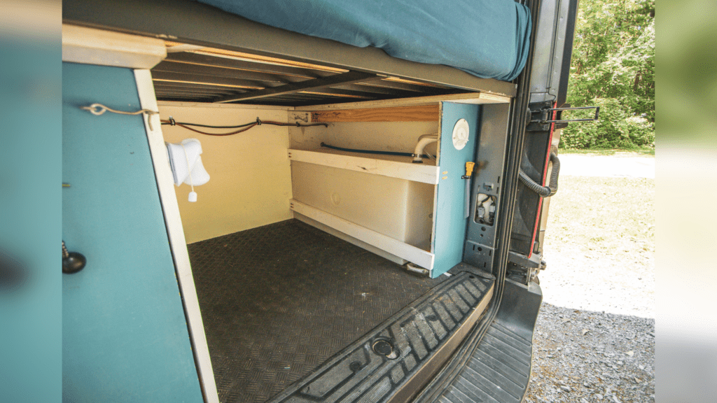Campervan water tank underneath bed